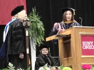 President Barbara Jean Morris presents Dr. Izabella Lokshina with the Chancellor’s Award for Scholarship and Creative Activity.