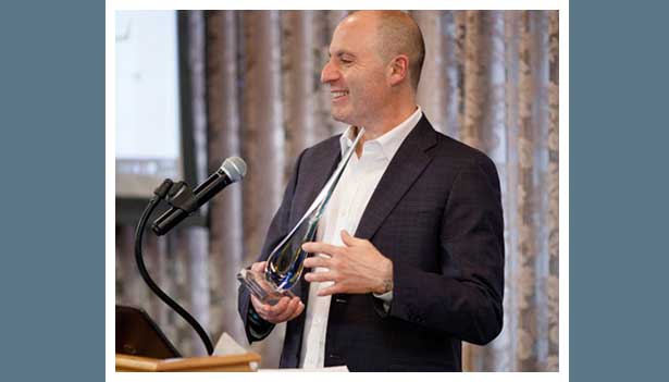 Scott Salmirs accepts Beta Gamma Sigma Business Achievement Award 